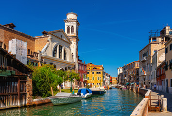 Fototapeta premium Panorama of Grand canal with boats and gondolas on sunny summer day in Venice. Italy