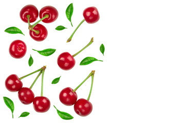 Some cherries with leaf closeup isolated on white background. With copy space for your text. Top view. Flat lay