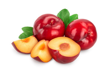 fresh red plum and slice with leaves isolated on white background