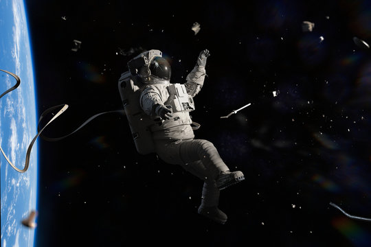 astronaut hit by space debris in orbit of planet Earth