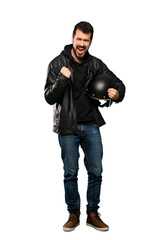 Naklejka premium Full-length shot of Biker man frustrated by a bad situation over isolated white background