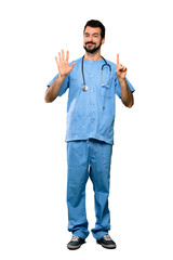 Full-length shot of Surgeon doctor man counting six with fingers over isolated white background