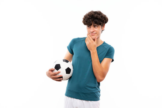 Young football player man over isolated white wall thinking an idea