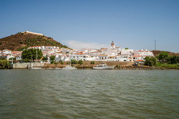 Fototapeta na wymiar Sanlucar de Guadiana pictured from Guadiana river