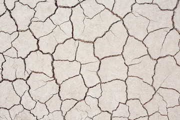 Top view of Dry land in the construction area. Cracked ground background
