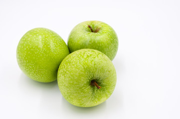 three green apple fruit isolated on white background