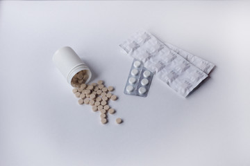 pills on a light background medical concept