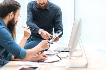 project Manager explaining to the staff the current task