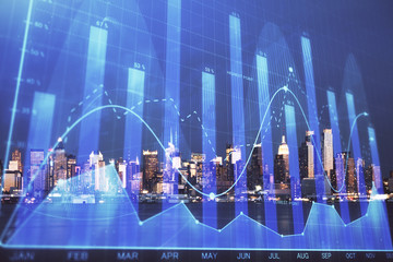 Financial graph on night city scape with tall buildings background double exposure. Analysis concept.