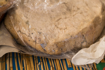 Traditional Sardinian cheese with worms. Banned and illegal cheese with flies and worms inside.