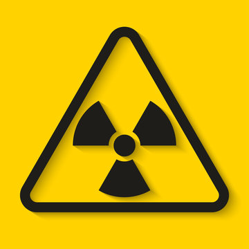 Danger radioactive sign on yellow background. Vector illustration