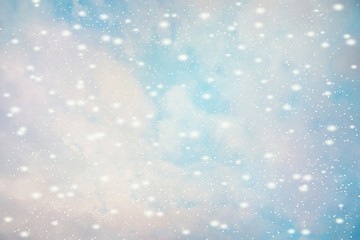 Winter landscape with falling snow