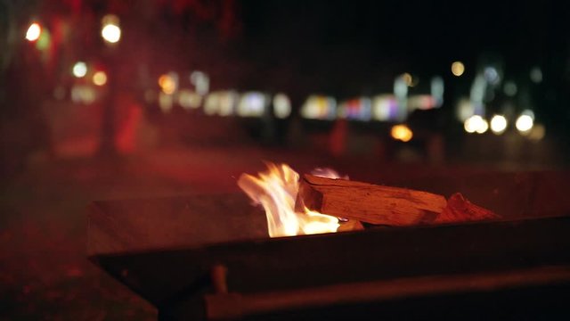 torch on the street. lamp with fire. entourage. fire show