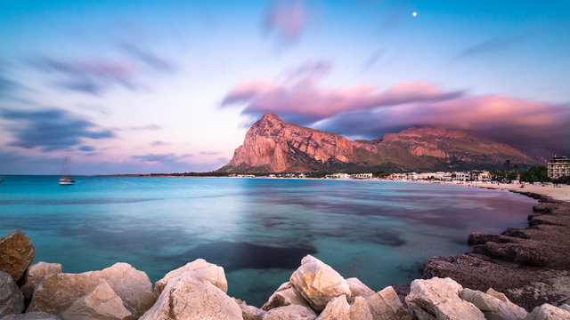 The sea at sunset from Italy, with some clouds on sky.