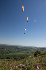 Paragliders above south moravia, Pálava, czech republic