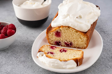 Cake with raspberries and whipped cream. Copy space.
