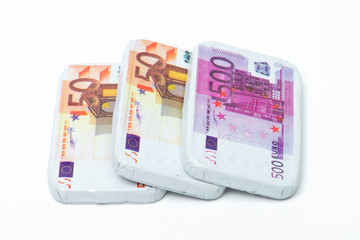 Chocolate banknotes of 50 and 500 euros, money, candy, sweets, Sinterklaas, typical Dutch, isolated background