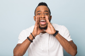 African American man scream making big announcement