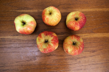 apples on wooden table