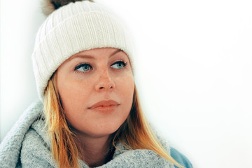 portrait of a young woman wearing a winter cap