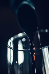 Pouring Red Wine Into Wine Glass, Close-Up