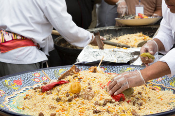 Chefs cook pilaf at the holiday
