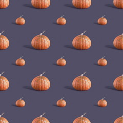 Pumpkin seamless pattern on a black background.