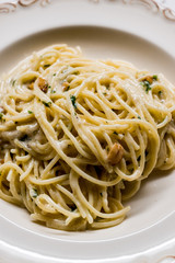 Pasta Spaghetti with Four Cheese Parmesan, Roquefort, Gravy, Gorgonzola, Cream and Garlic and Black Pepper.