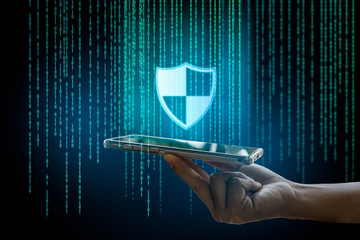 Cyber security Business, technology, internet and networking concept.Man using dark web with smartphone. Hacker with cellphone. Mobile phone fraud, online scam and cyber security threat.