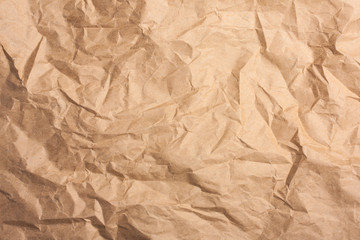 Old brown crumpled wrinkled paper    as a background