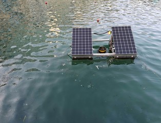 two solar panels floating in the sea