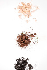 Professional make-up brush on colorful crushed eyeshadow