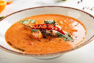 Hot chili tom yum or tom yam with squid