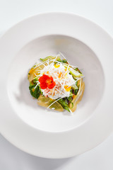 Red king crab with spinach and pear top view