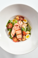 Tasty caesar with salmon top view