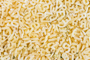 Raw alphabet abc letter pasta.