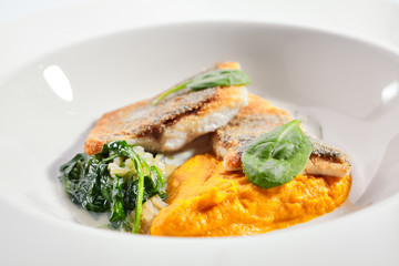 Cod fillet with pumpkin puree and spinach