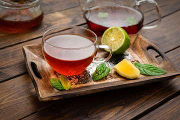 Tea set composition on wooden palette in rustic style