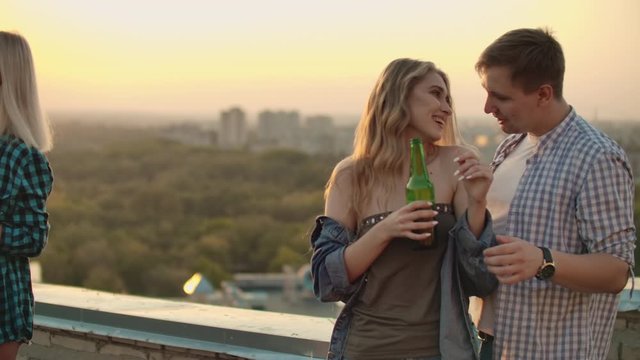 Young couple is dacing on the party