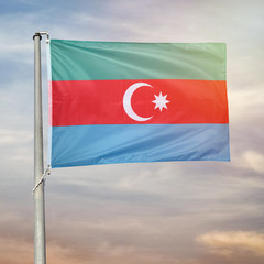 Fototapeta na wymiar flag of azerbaijan in the sky