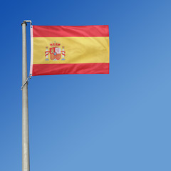 Flag of Spain in blue sky