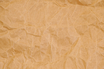 Brown crumpled packaging paper background texture. Kraft Paper Coarse. Wrinkled paper bag
