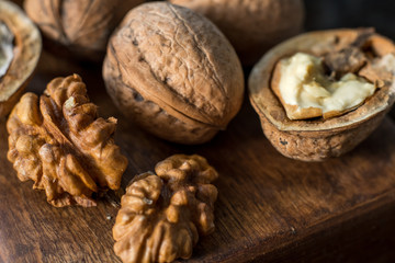 healthy walnuts on wooden background