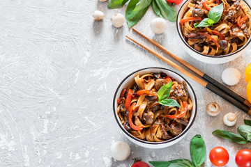 Wheat noodles udon with mushrooms and vegetables in Tereyaki sauce