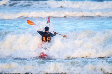 Kayaking in ocean surf