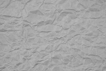 White crumpled packaging paper background texture. Grey Kraft Paper Coarse. Wrinkled paper bag