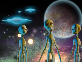 Three aliens. Flying saucers in space © rolffimages