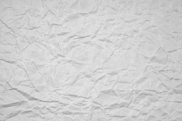 White crumpled packaging paper background texture. Grey Kraft Paper Coarse. Wrinkled paper bag