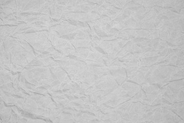 White crumpled packaging paper background texture. Grey Kraft Paper Coarse. Wrinkled paper bag