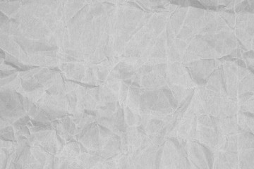White crumpled packaging paper background texture. Grey Kraft Paper Coarse. Wrinkled paper bag